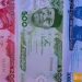President Buhari unveils newly redesigned naira notes