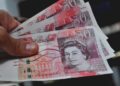 Pound Slumps as UK Economic Contraction Exceeds Expectations in July