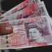Pound Slumps as UK Economic Contraction Exceeds Expectations in July